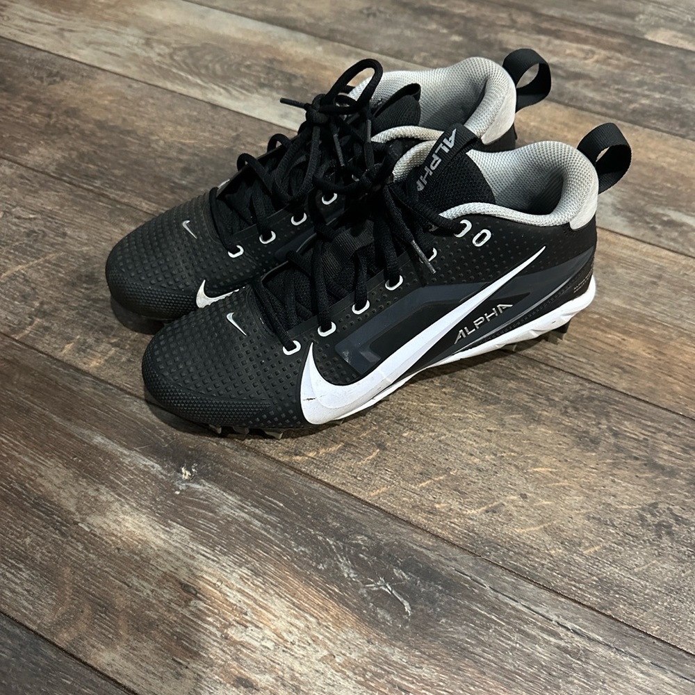 Brand new!!! Nike Alpha Black and White Cleats